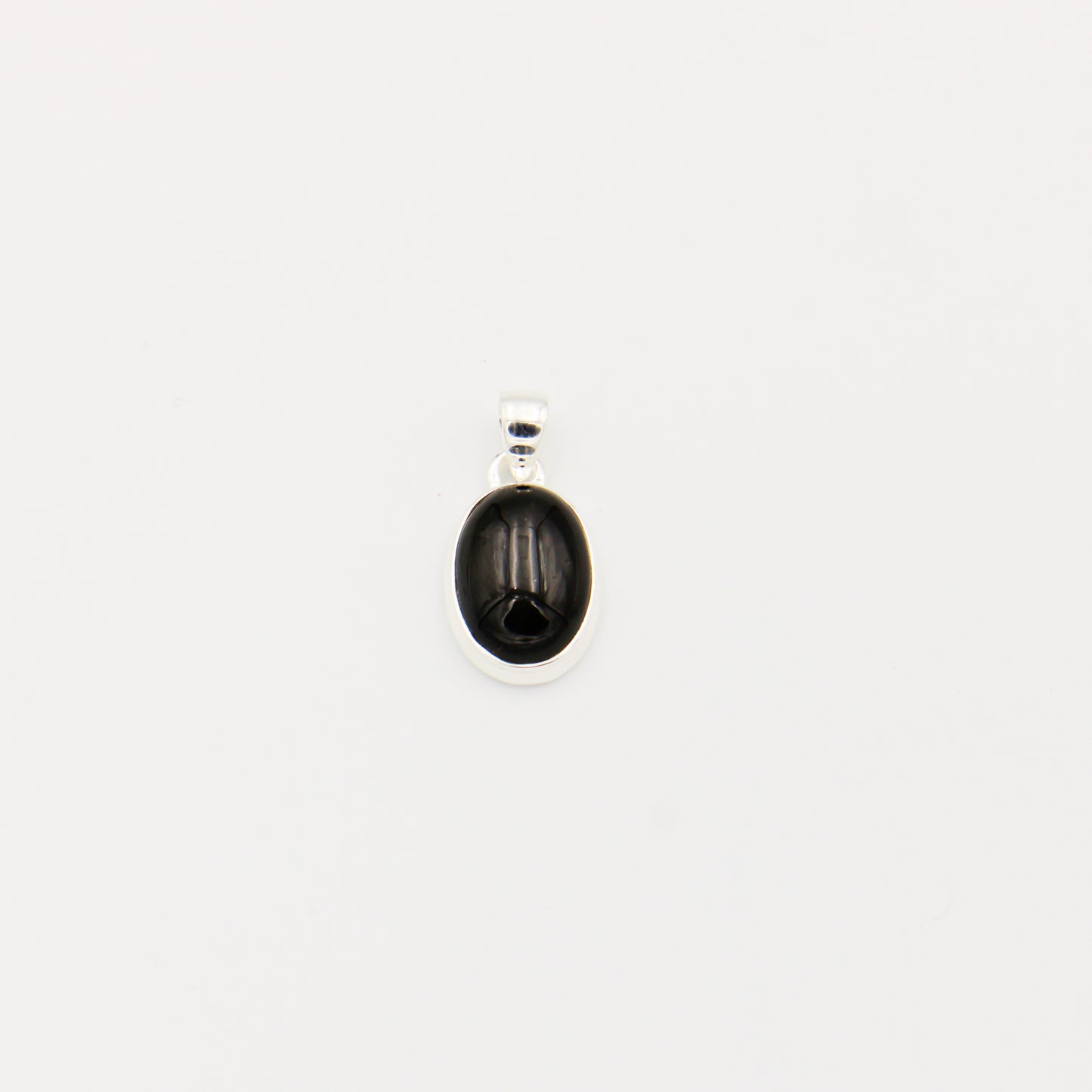 Black Star Oval Sterling Pendant