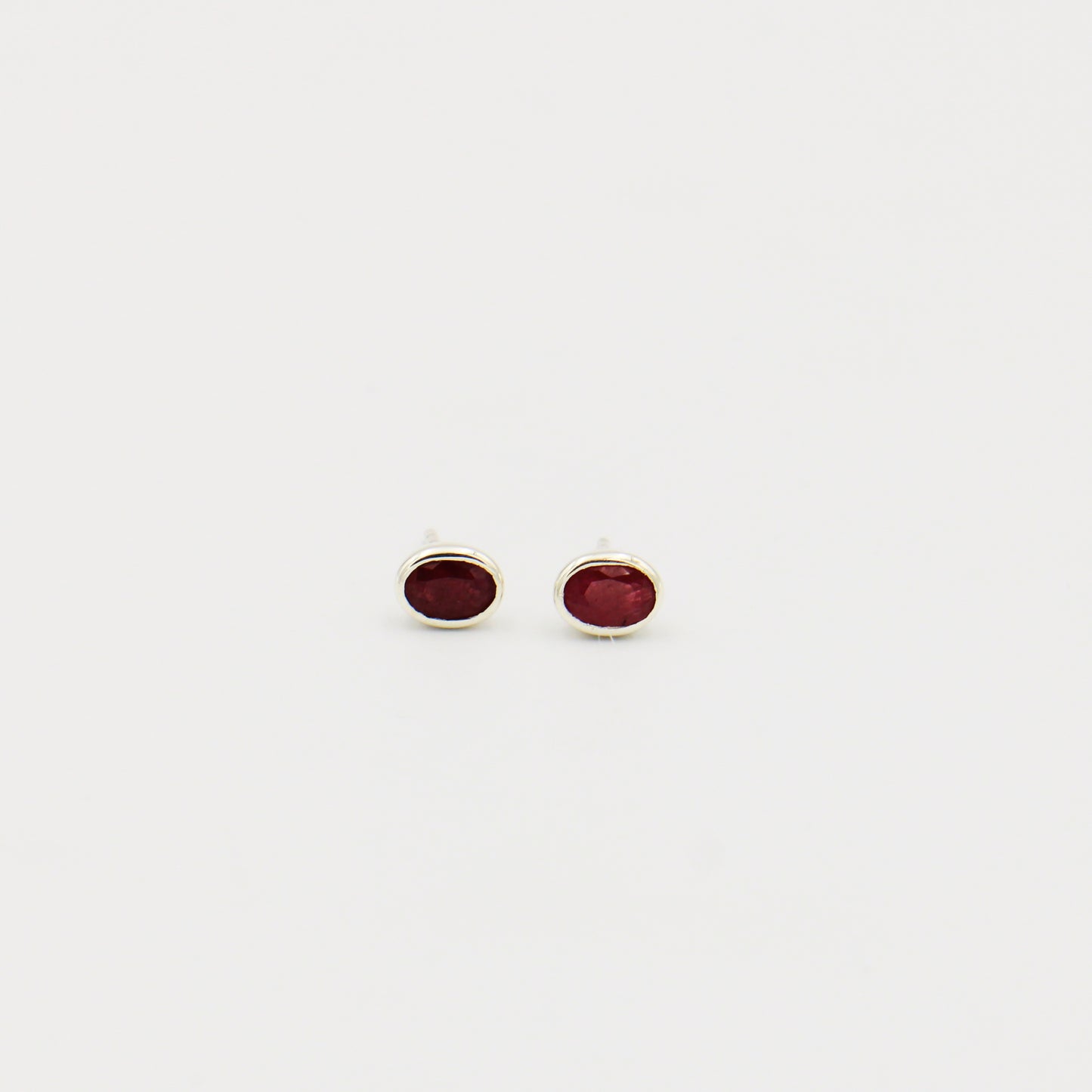 Ruby Faceted Oval Bezel Sterling Studs