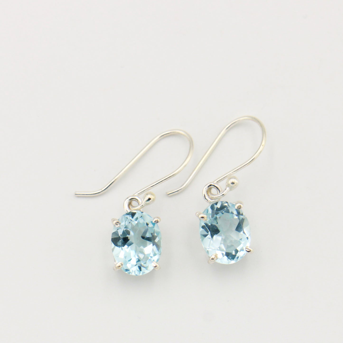 Blue Topaz Oval Prong Set Sterling Earrings