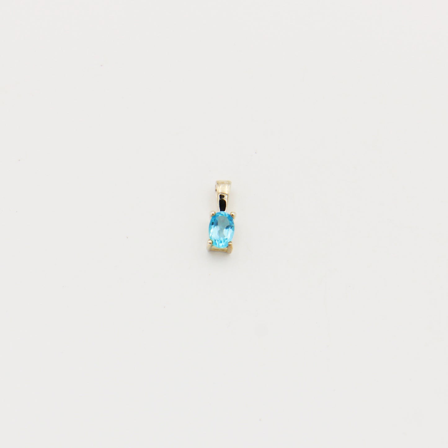 Blue Topaz Tiny Oval Sterling Pendant