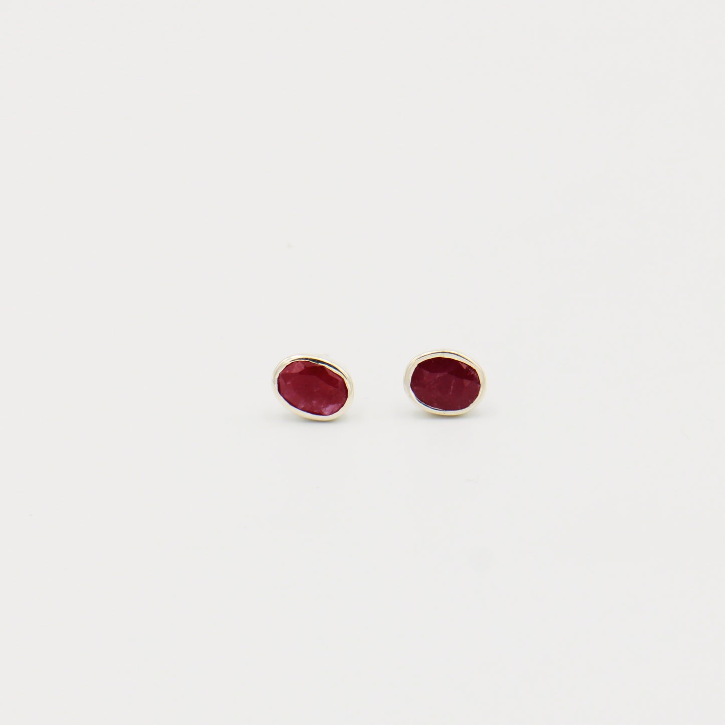 Ruby Faceted Oval Sterling Studs