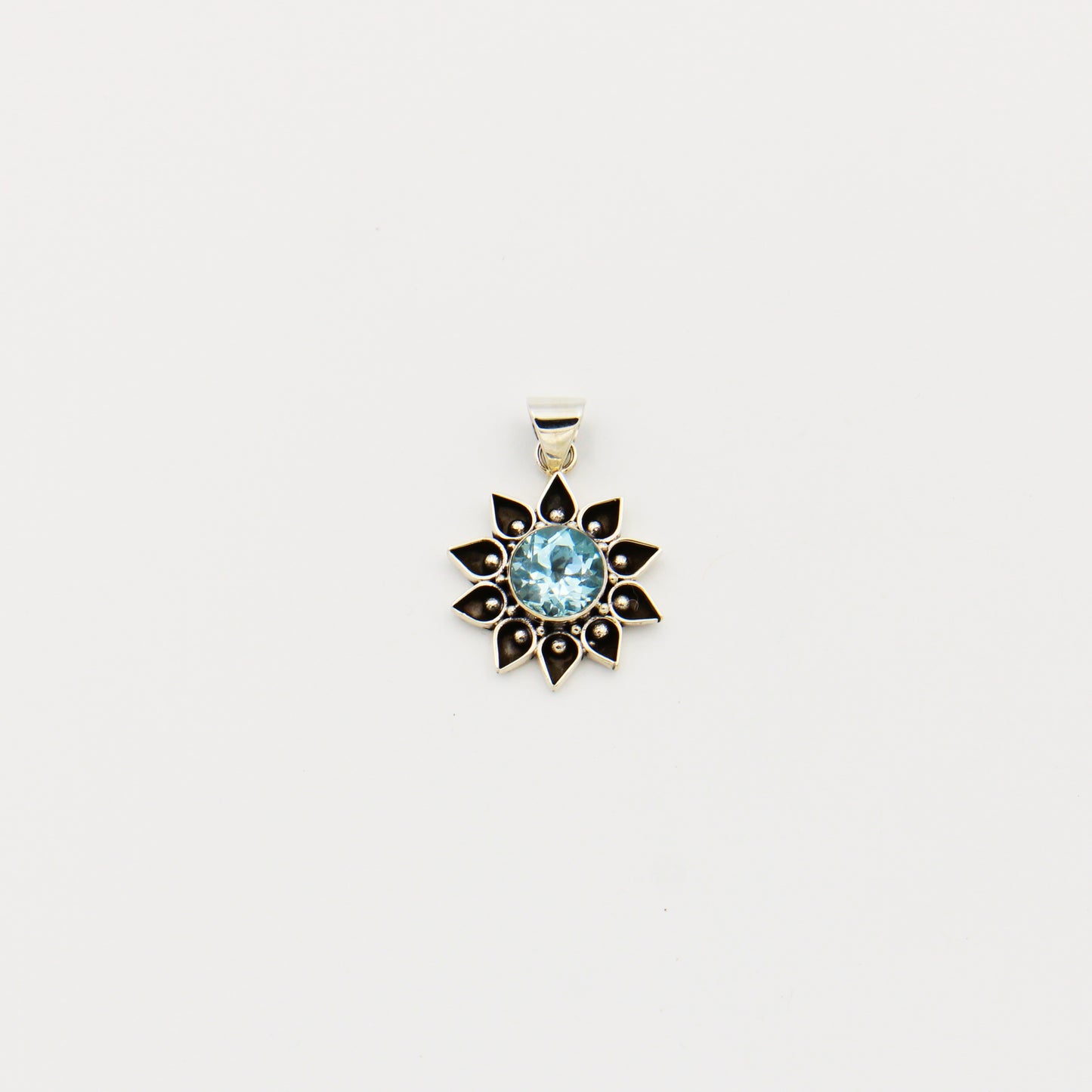 Blue Topaz Flower Sterling Pendant